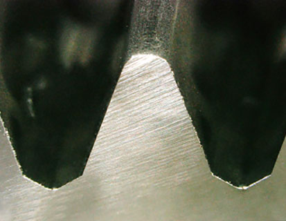 Removal of hob cutter edge burrs caused from machining